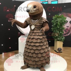 Brown Pangolin mascot costume character dressed with a Empire Waist Dress and Necklaces