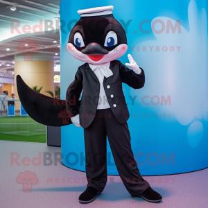 Black Killer Whale mascot costume character dressed with a Blouse and Berets
