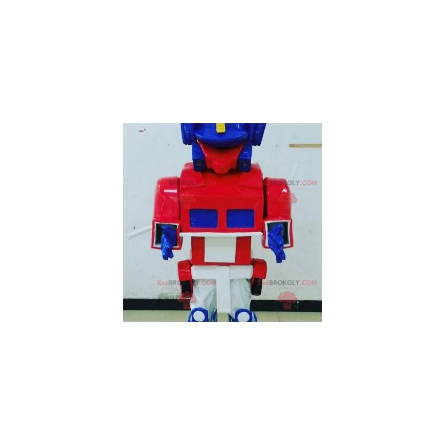 Blå, hvitt og rødt leketøy maskot Transformers måte -