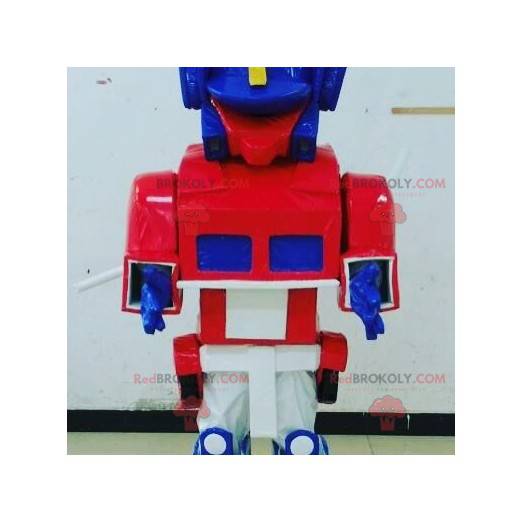 Blå, hvid og rød legetøjsmaskot Transformers måde -