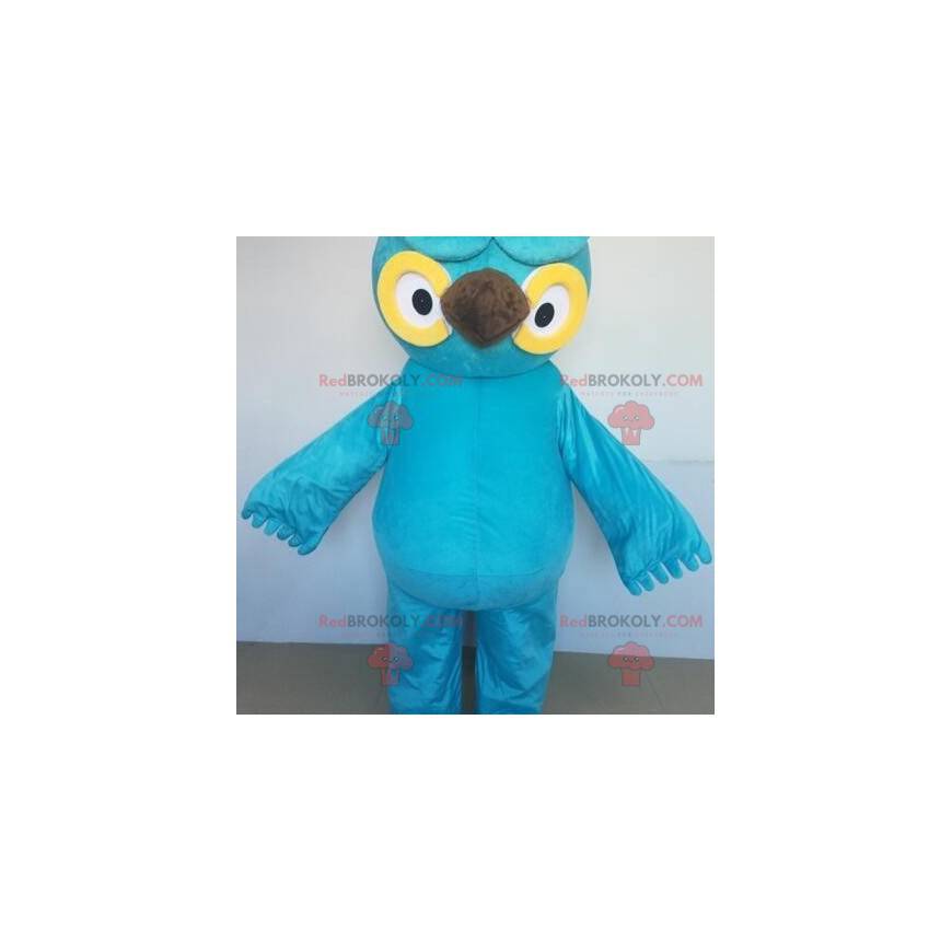 Giant blue and yellow owl mascot with big eyes - Redbrokoly.com