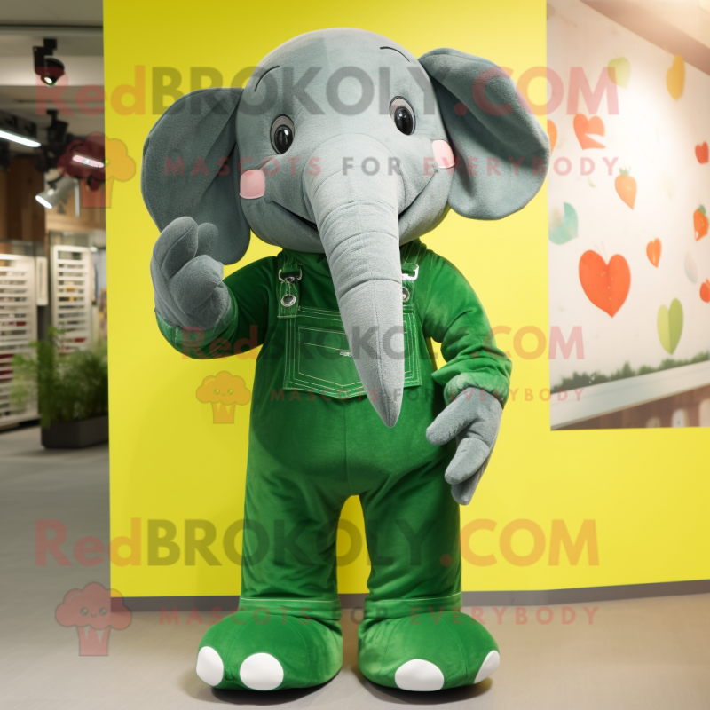 Forest Green Elephant mascot costume character dressed with a Dungarees and Earrings