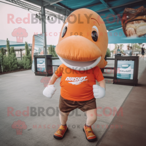 Rust Whale mascot costume character dressed with a Running Shorts and Necklaces