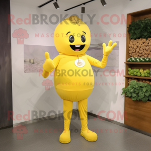 Yellow Grape mascot costume character dressed with a Long Sleeve Tee and Belts