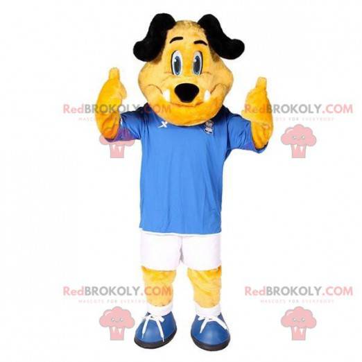 Mascote cachorro amarelo e preto em roupas esportivas -