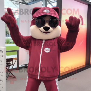 Maroon Trapeze Artist mascot costume character dressed with a Hoodie and Sunglasses