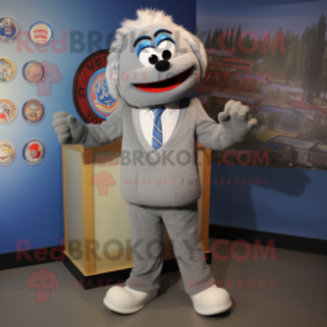 Gray Jambalaya mascot costume character dressed with a Suit Jacket and Anklets