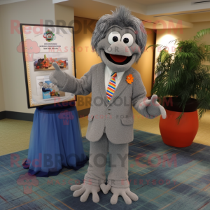 Gray Jambalaya mascot costume character dressed with a Suit Jacket and Anklets