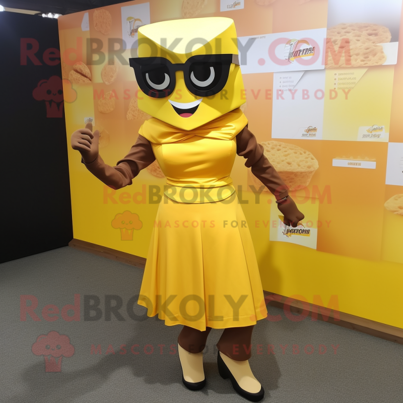 Yellow Chocolate Bars mascot costume character dressed with a A-Line Skirt and Sunglasses