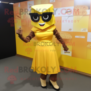 Yellow Chocolate Bars mascot costume character dressed with a A-Line Skirt and Sunglasses