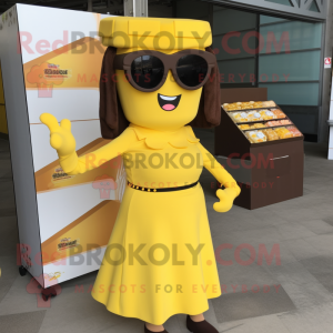 Yellow Chocolate Bars mascot costume character dressed with a A-Line Skirt and Sunglasses
