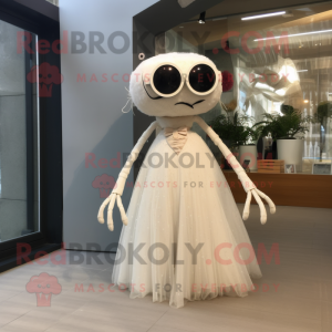 Beige Spider mascot costume character dressed with a Wedding Dress and Eyeglasses