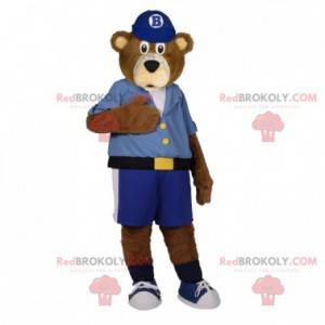 Brown bear mascot dressed in a shirt with shorts -