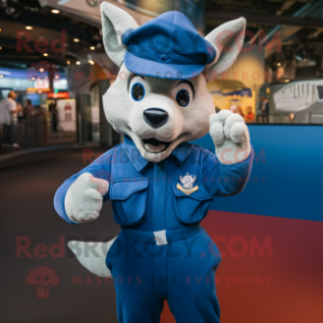 Blue Dingo mascot costume character dressed with a Overalls and Berets