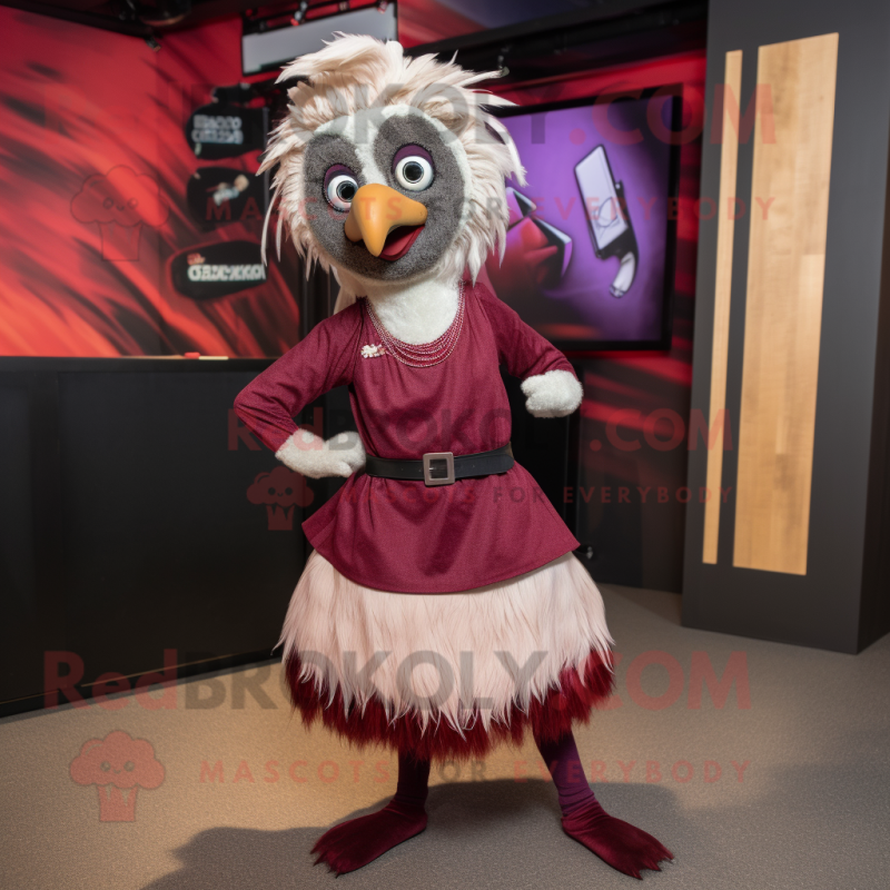 Maroon Emu mascot costume character dressed with a Skirt and Headbands Maroon Emu mascot costume character dressed with a Skirt and Headbands