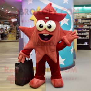Maroon Starfish mascot costume character dressed with a Corduroy Pants and Wallets