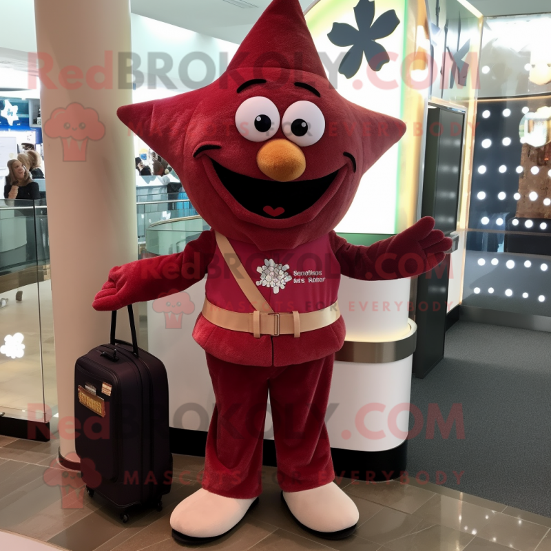 Maroon Starfish mascot costume character dressed with a Corduroy Pants and Wallets