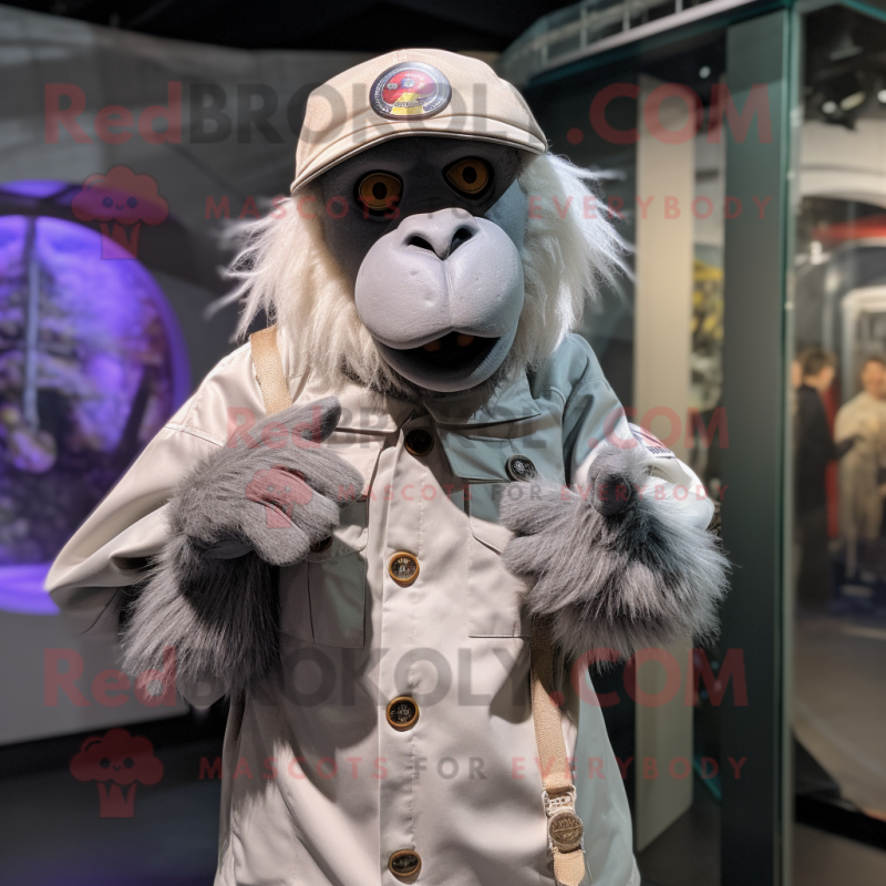 Silver Baboon mascot costume character dressed with a Graphic Tee and Berets Silver Baboon mascot costume character dressed with a Graphic Tee and Berets
