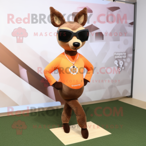 Brown Roe Deer mascot costume character dressed with a Yoga Pants and Sunglasses