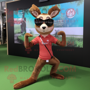 Brown Roe Deer mascot costume character dressed with a Yoga Pants and Sunglasses