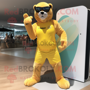 Yellow Puma mascot costume character dressed with a Swimwear and Shoe clips