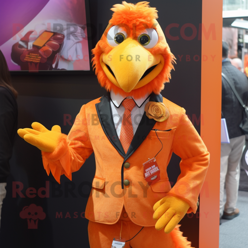 Orange Tandoori Chicken mascot costume character dressed with a Suit Jacket and Keychains Orange Tandoori Chicken mascot costume character dressed with a Suit Jacket and Keychains