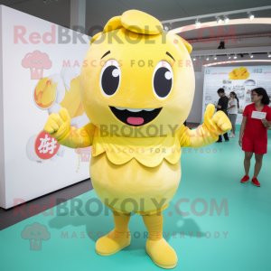 Yellow Dim Sum mascot costume character dressed with a Shorts and Earrings