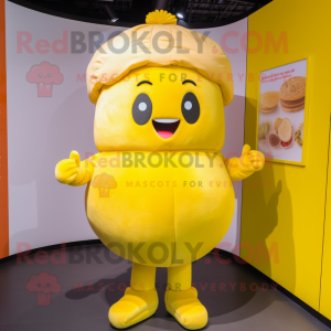 Yellow Dim Sum mascot costume character dressed with a Shorts and Earrings