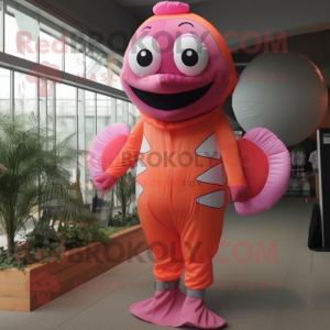Pink Clown Fish mascot costume character dressed with a Jumpsuit and Foot pads