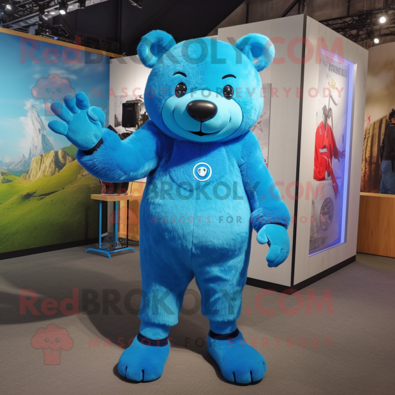 Blue Bear mascot costume character dressed with a Rash Guard and Keychains