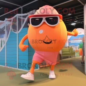 Peach Spaghetti mascot costume character dressed with a Running Shorts and Sunglasses