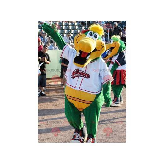 Green and yellow crocodile mascot smiling - Redbrokoly.com