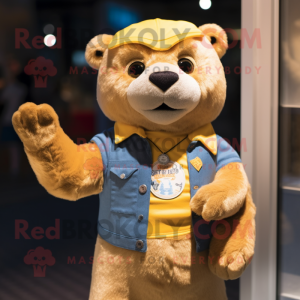 Gold Otter mascot costume character dressed with a Denim Shorts and Keychains