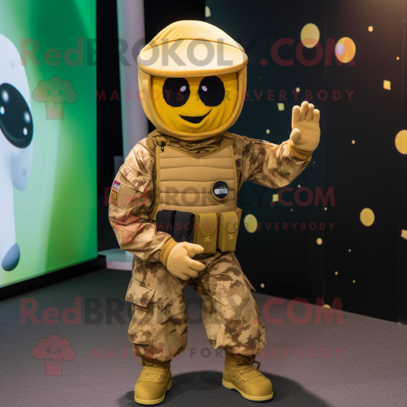 Gold Para Commando mascot costume character dressed with a Mini Dress and Caps Gold Para Commando mascot costume character dressed with a Mini Dress and Caps