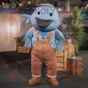 Rust Whale mascot costume character dressed with a Chambray Shirt and Suspenders