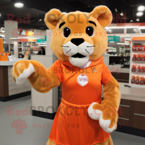 Orange Mountain Lion mascot costume character dressed with a Pleated Skirt and Mittens