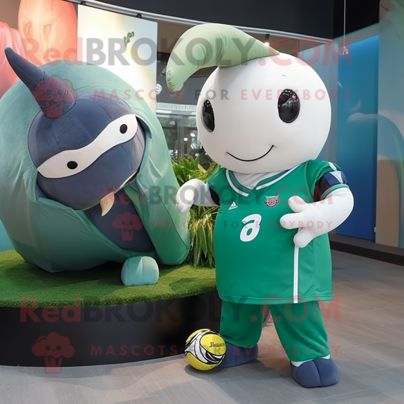 Green Narwhal mascot costume character dressed with a Rugby Shirt and Watches