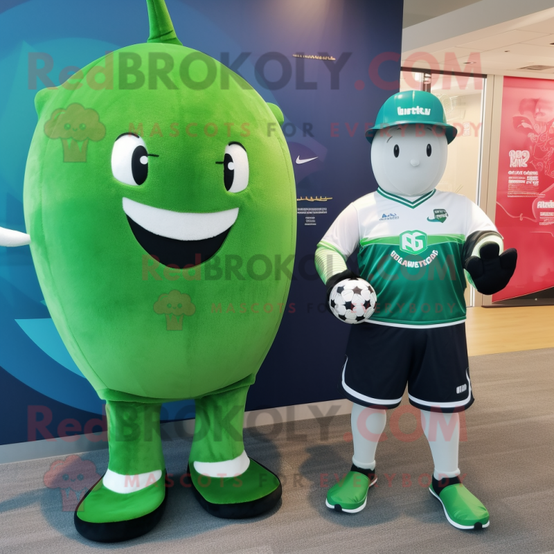 Green Narwhal mascot costume character dressed with a Rugby Shirt and Watches