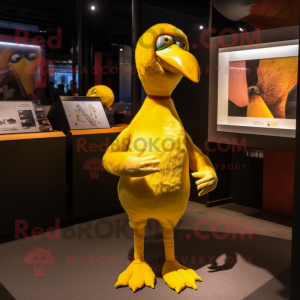 Yellow Dodo Bird mascot costume character dressed with a Mini Skirt and Cufflinks
