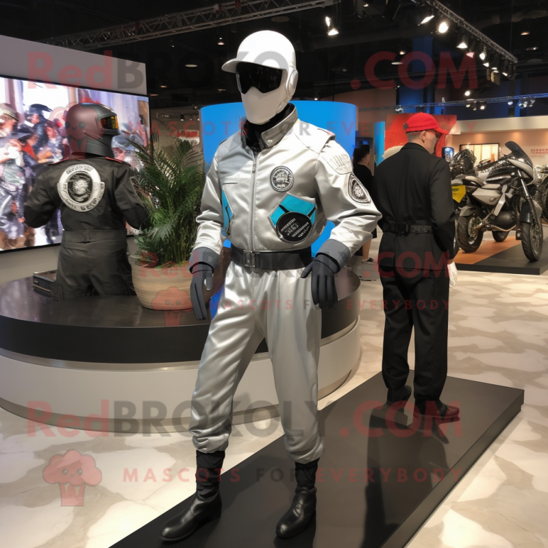 Silver Gi Joe mascot costume character dressed with a Moto Jacket and Coin purses Silver Gi Joe mascot costume character dressed with a Moto Jacket and Coin purses