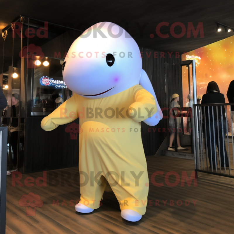 Gold Beluga Whale mascot costume character dressed with a Jeggings and Hairpins