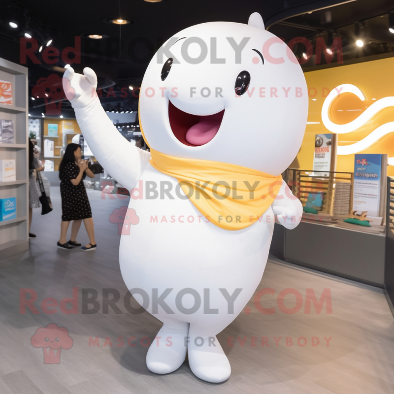 Gold Beluga Whale mascot costume character dressed with a Jeggings and Hairpins