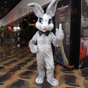 Silver Wild Rabbit mascot costume character dressed with a Jumpsuit and Handbags