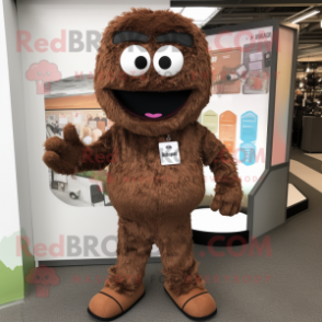 Brown Momentum mascot costume character dressed with a Romper and Suspenders