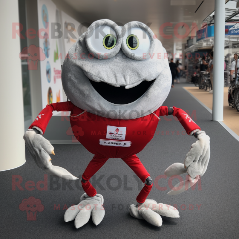 Silver Crab mascot costume character dressed with a Running Shorts and Messenger bags