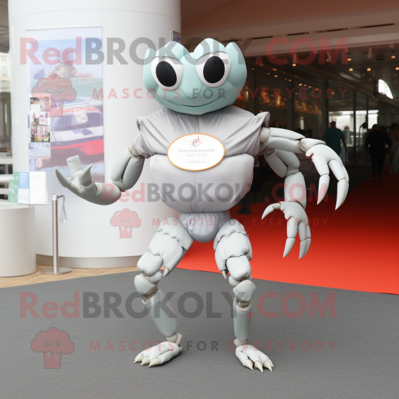 Silver Crab mascot costume character dressed with a Running Shorts and Messenger bags