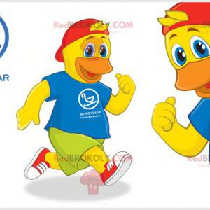 Yellow duck chick mascot with a colorful outfit - Redbrokoly.com