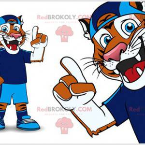 Mascote tigre laranja e branco em roupas esportivas azuis -