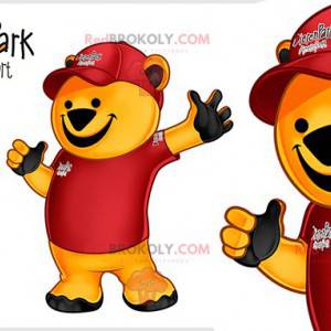 Gul bjørnemaskot klædt i et rødt tøj - Redbrokoly.com