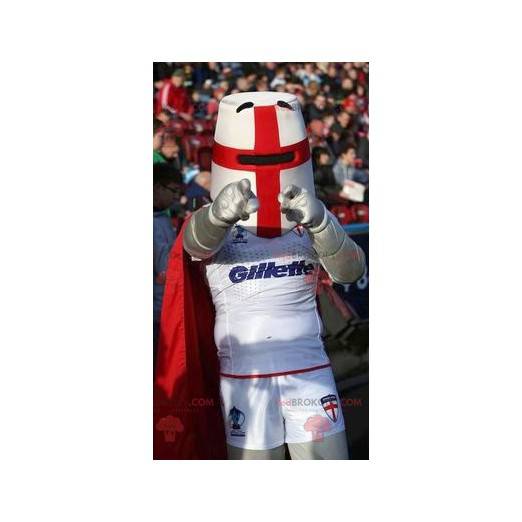 Mascotte de chevalier avec un casque et une cape rouge -